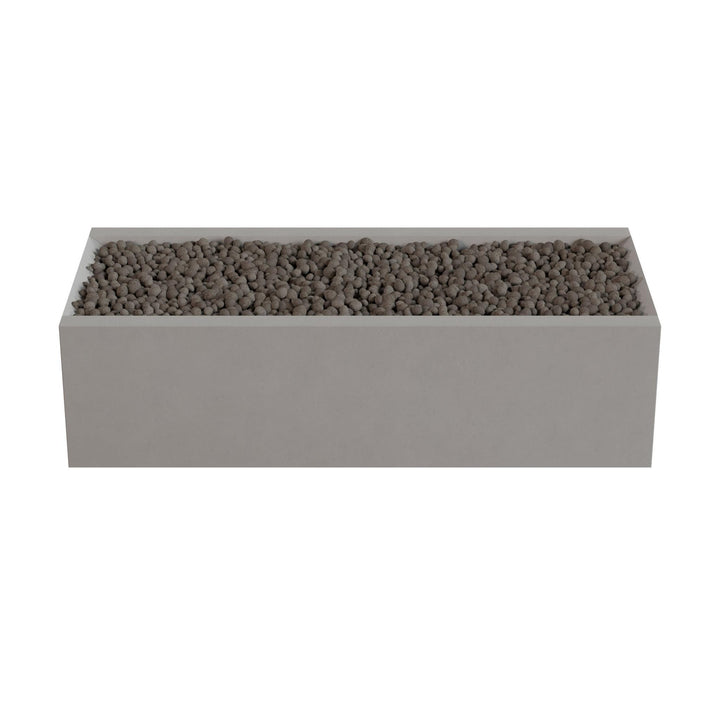 A rectangular planter box filled with small rocks or pebbles.