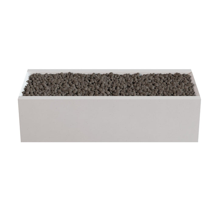A rectangular planter box filled with small rocks or pebbles.